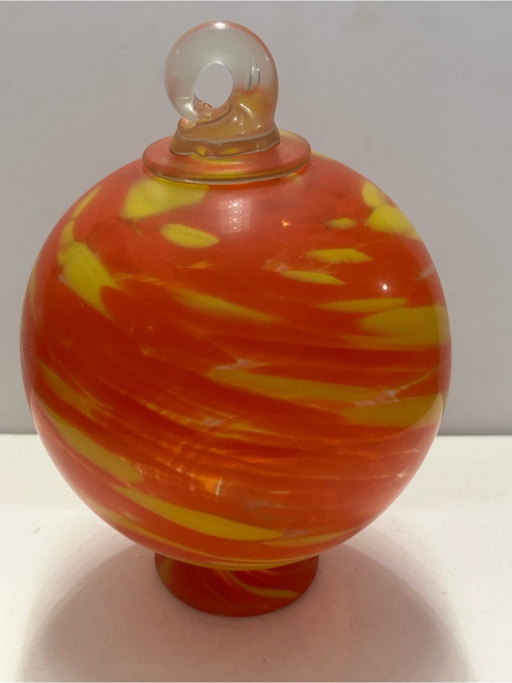 Handblown Swirl Glass Orb ornament Orange Red Yellow